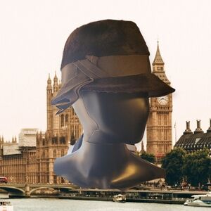 Stylish 60s Brown Hat with Ribbon Detail